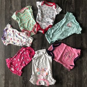 Various Onsies size 0-12 months